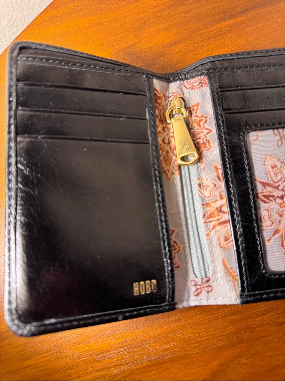Hobo Robin Compact Wallet in Black Polished Leather